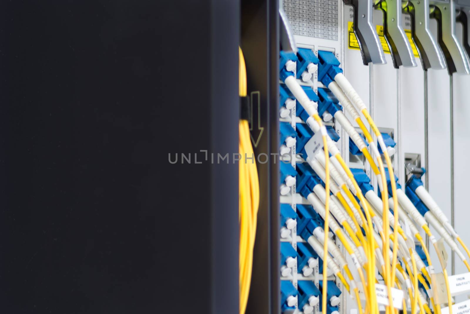 fiber optic with servers in a technology data center .