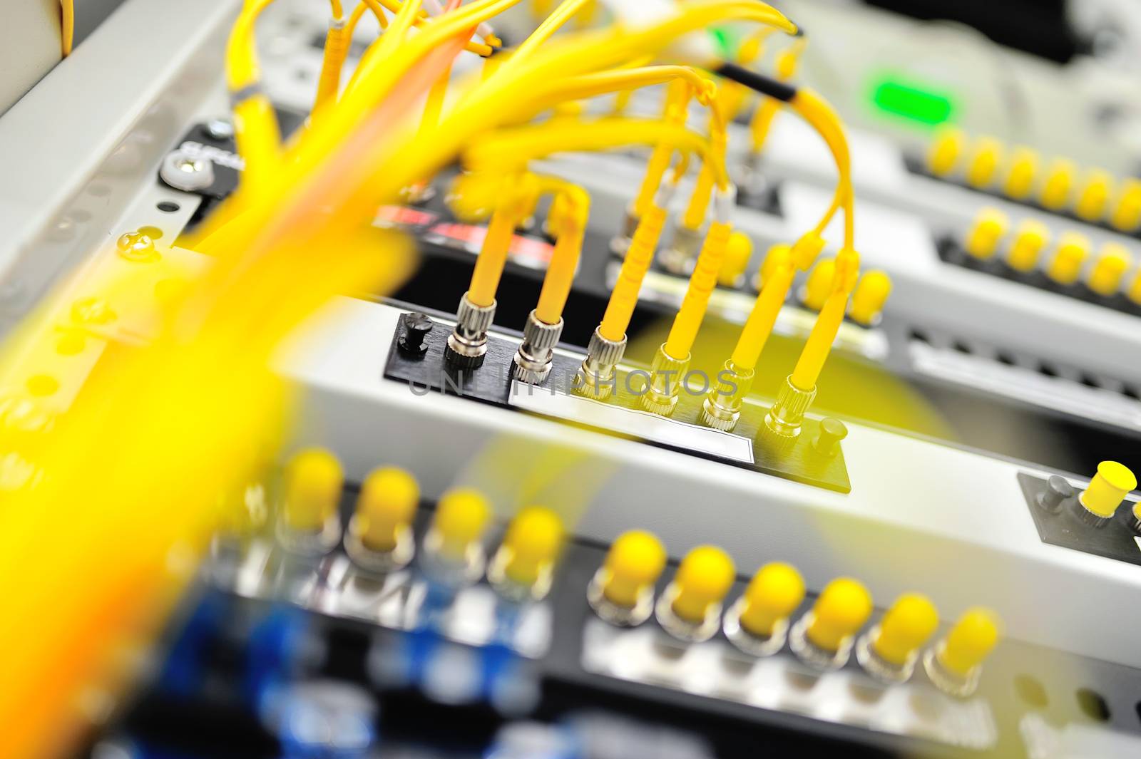 fiber optic with servers in a technology data center .