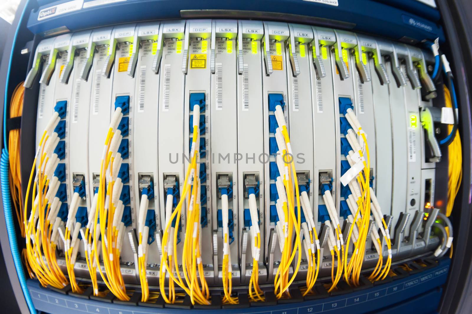 fiber optic with servers in a technology data center .