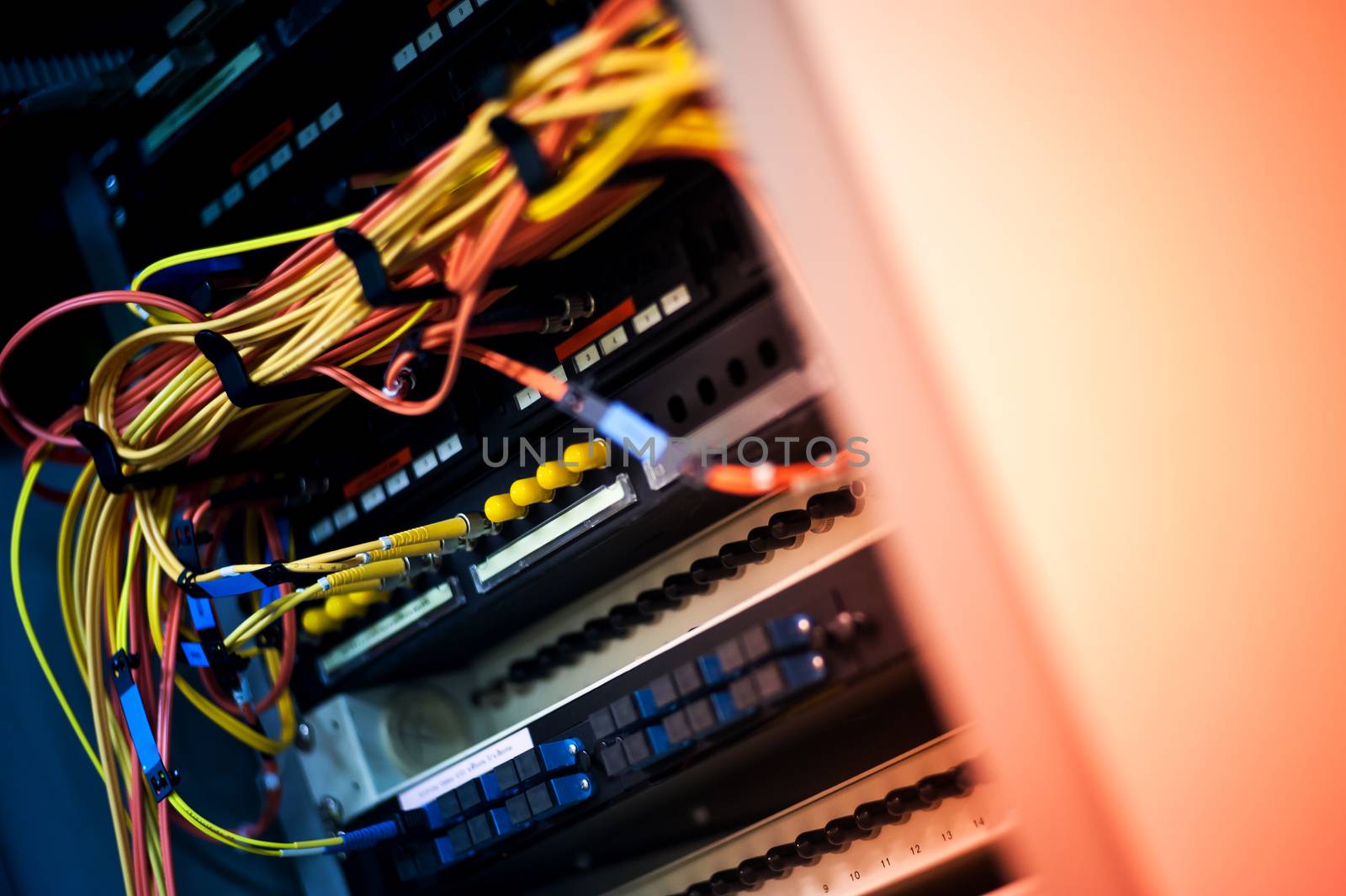 fiber optic with servers in a technology data center .