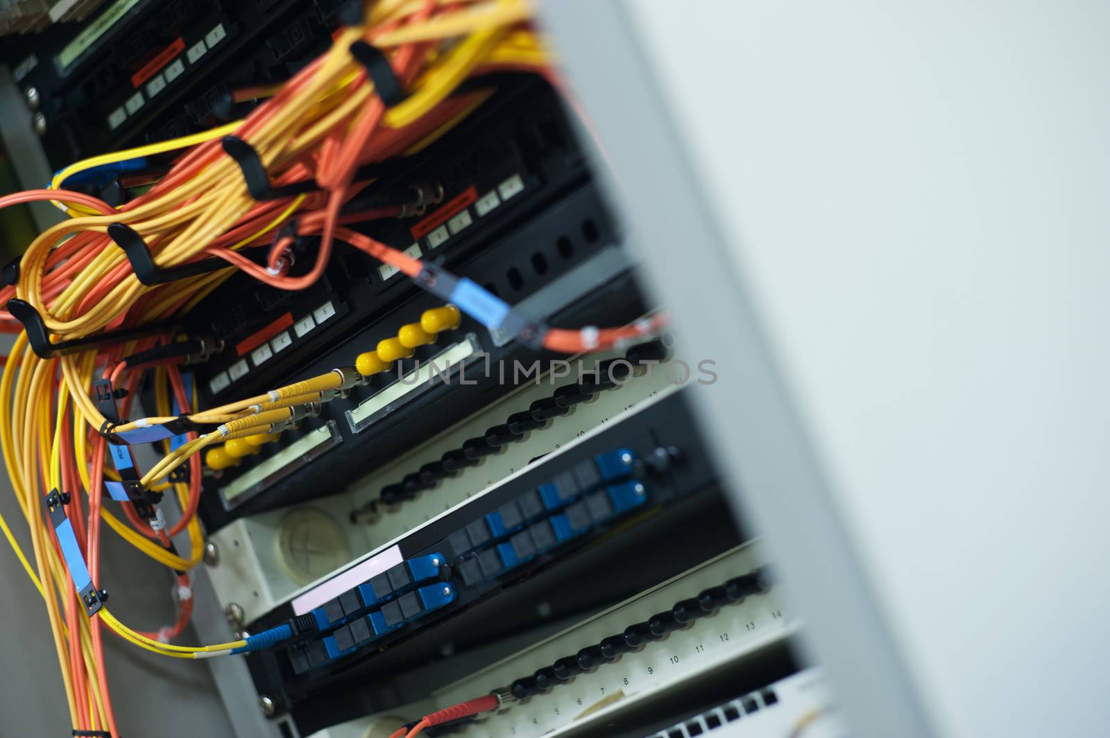 fiber optic with servers in a technology data center .