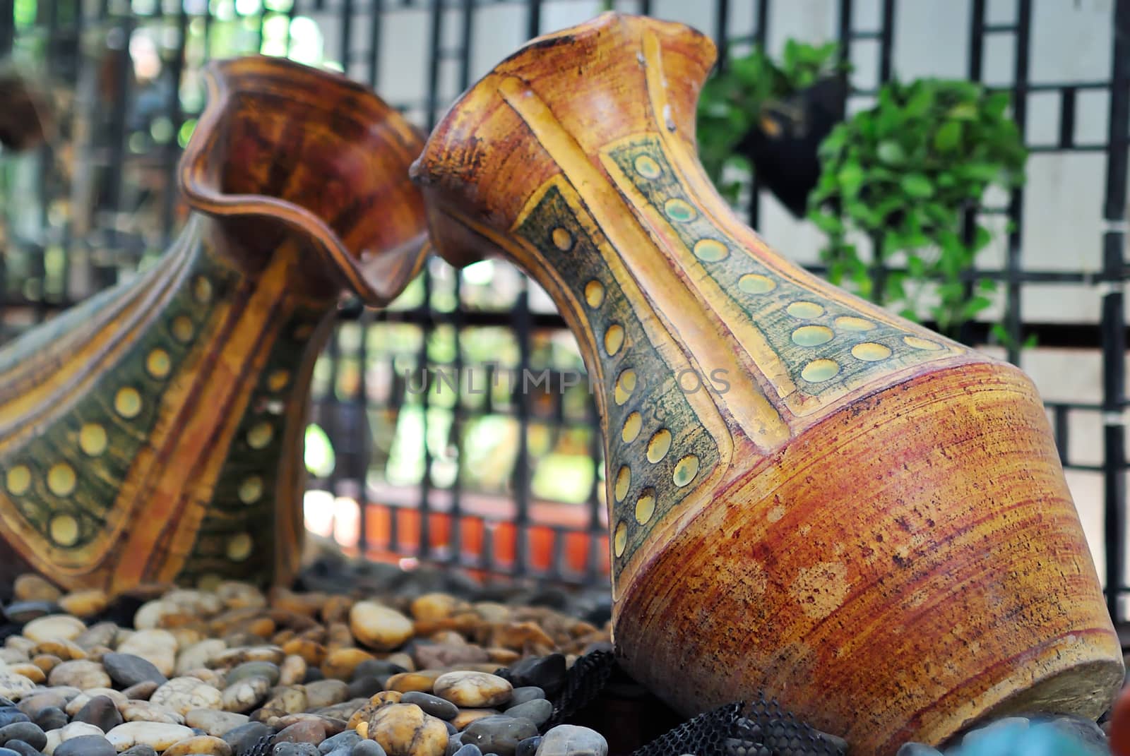 An Jar carved in garden place .