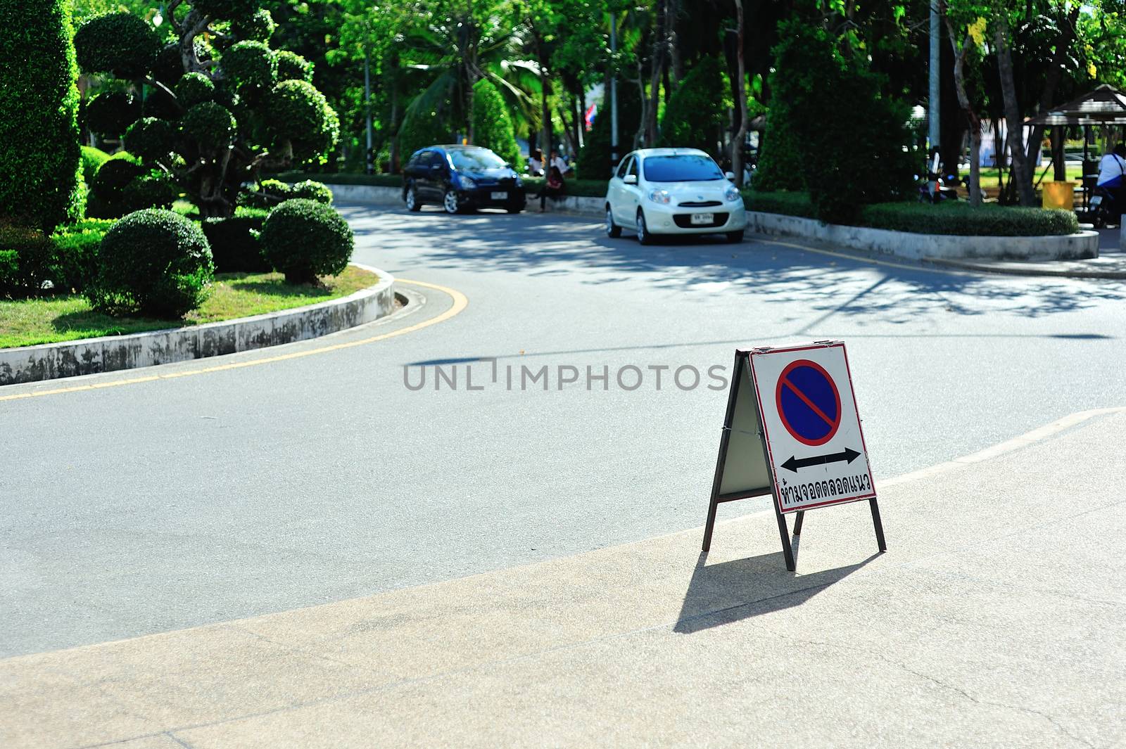 No parking symbol in sun light .