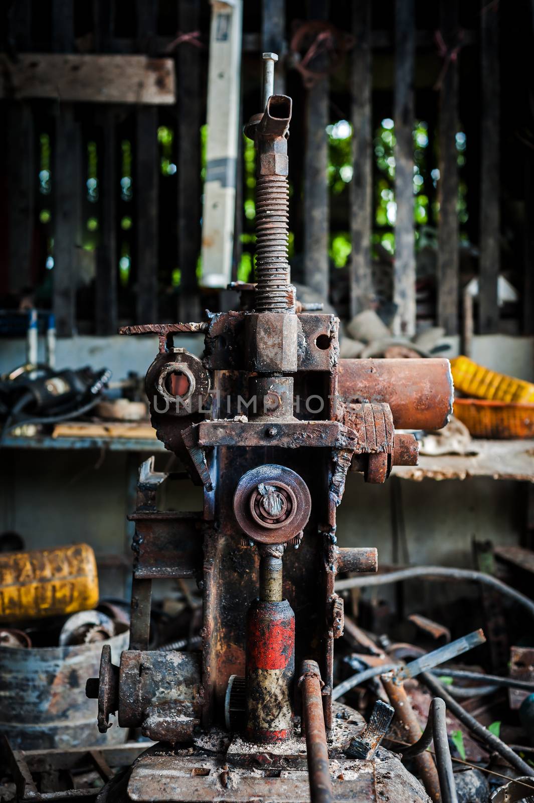 An Old tool in dirty place .