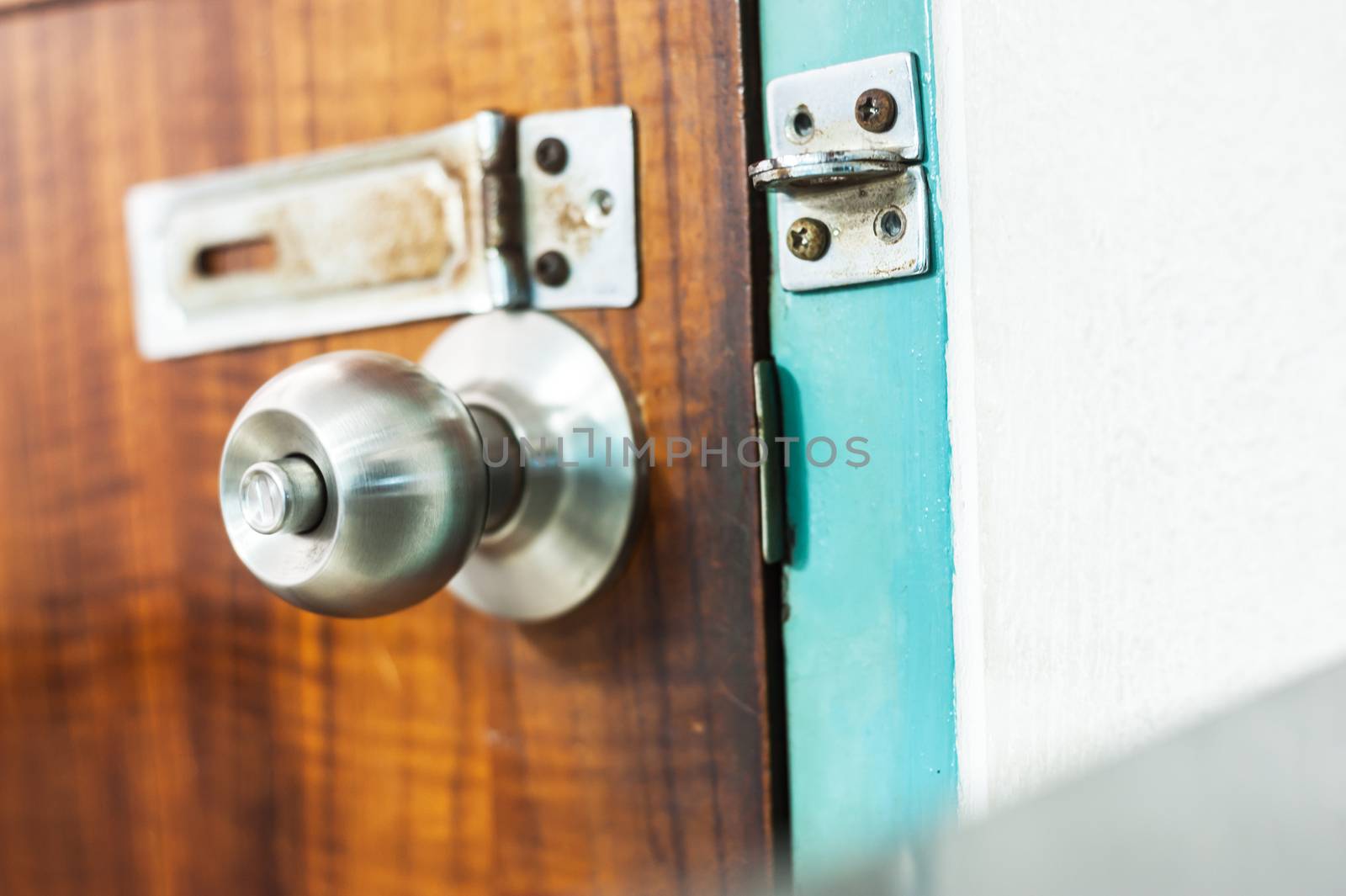 An Steel knob in soft light .