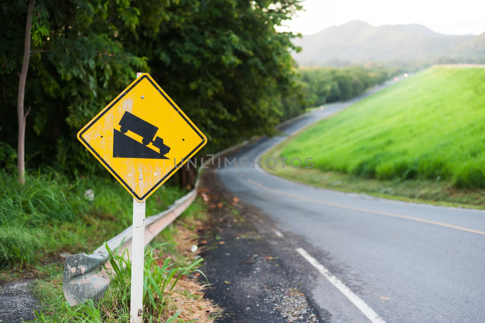 An Steep sign symbol warning dangerous .