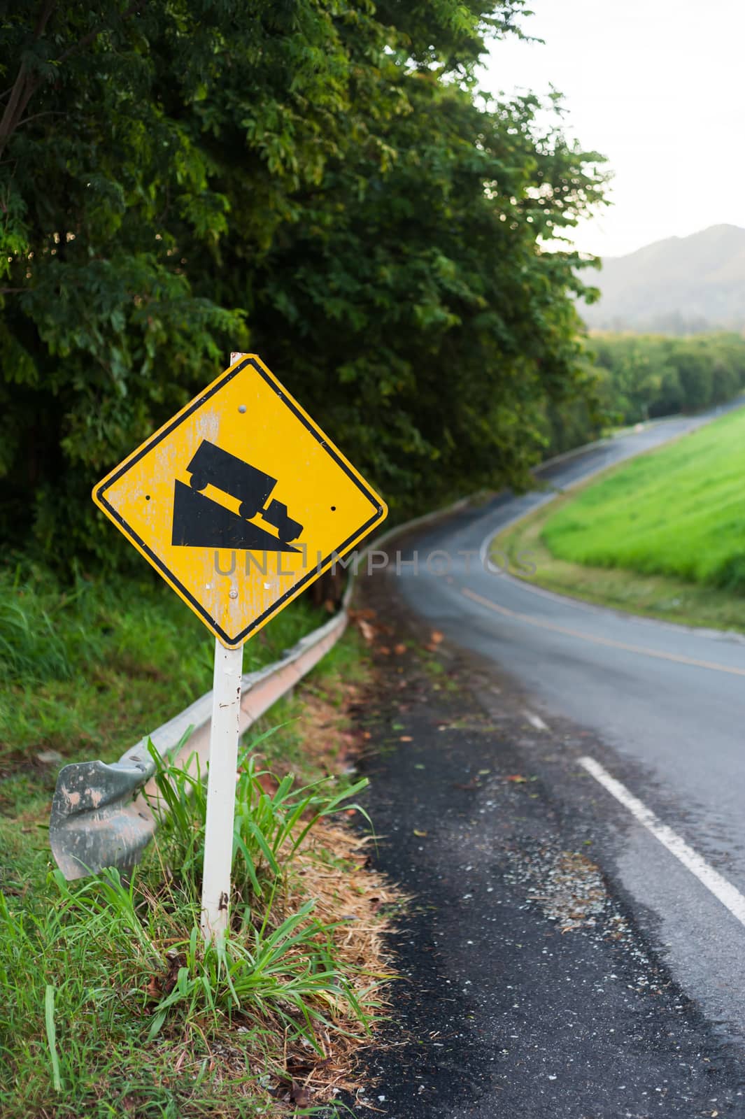 An Steep sign symbol warning dangerous .