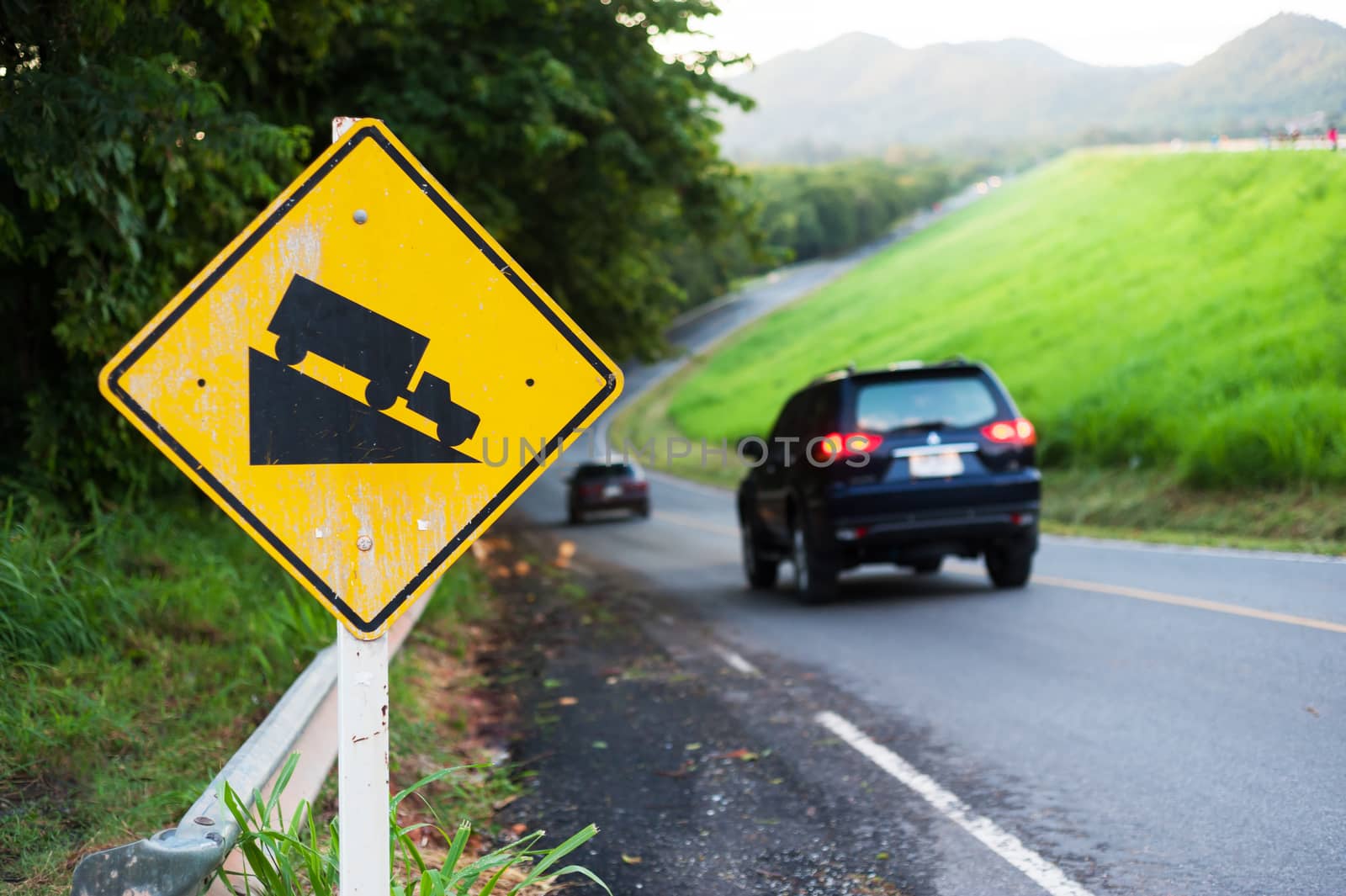 An Steep sign symbol warning dangerous .