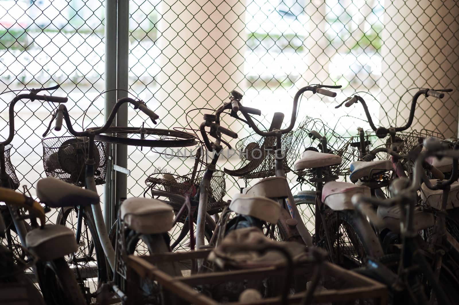 An Old bicycle in soft light .