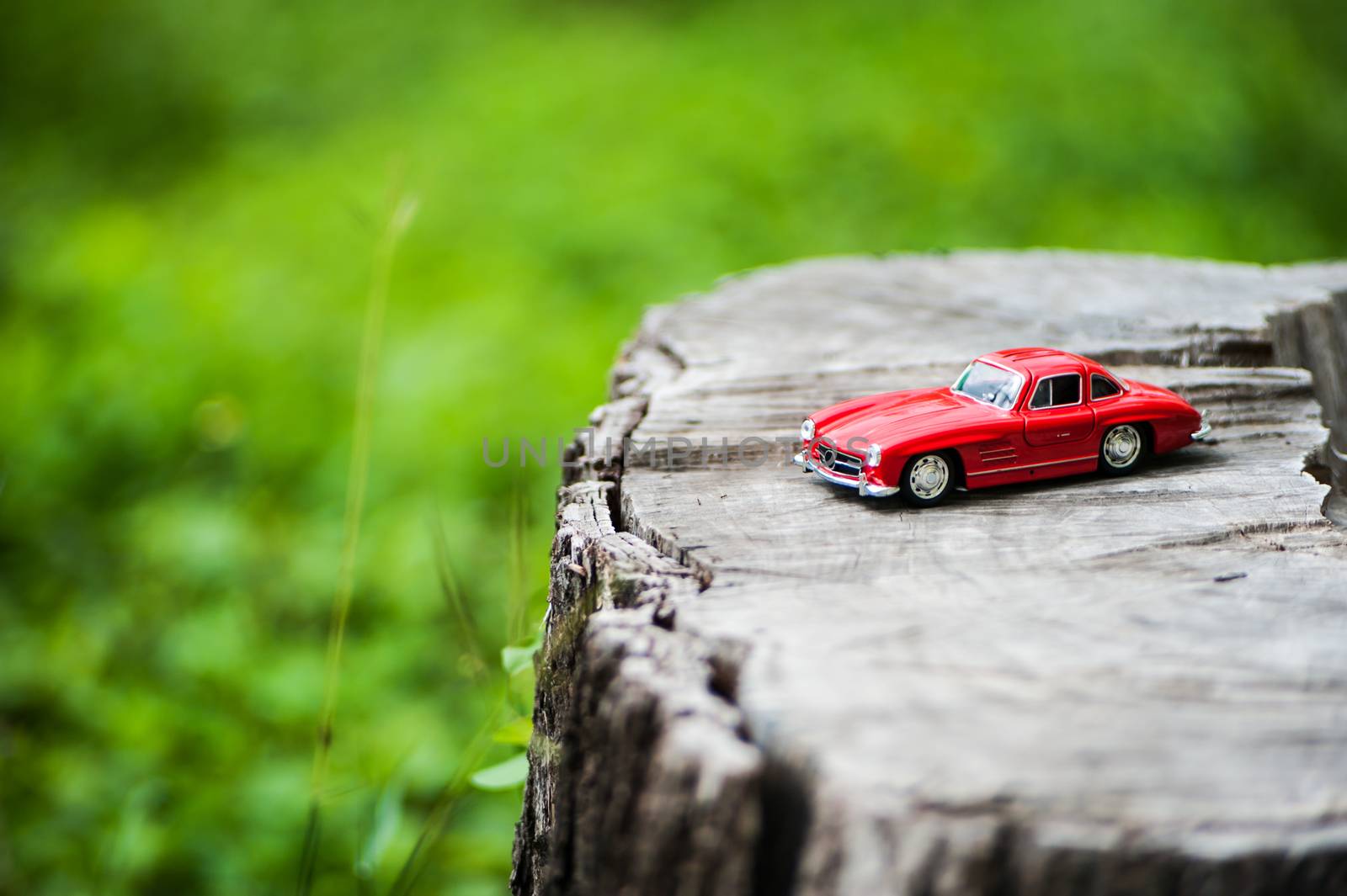 Sport car model in nature place . by panumazz@gmail.com
