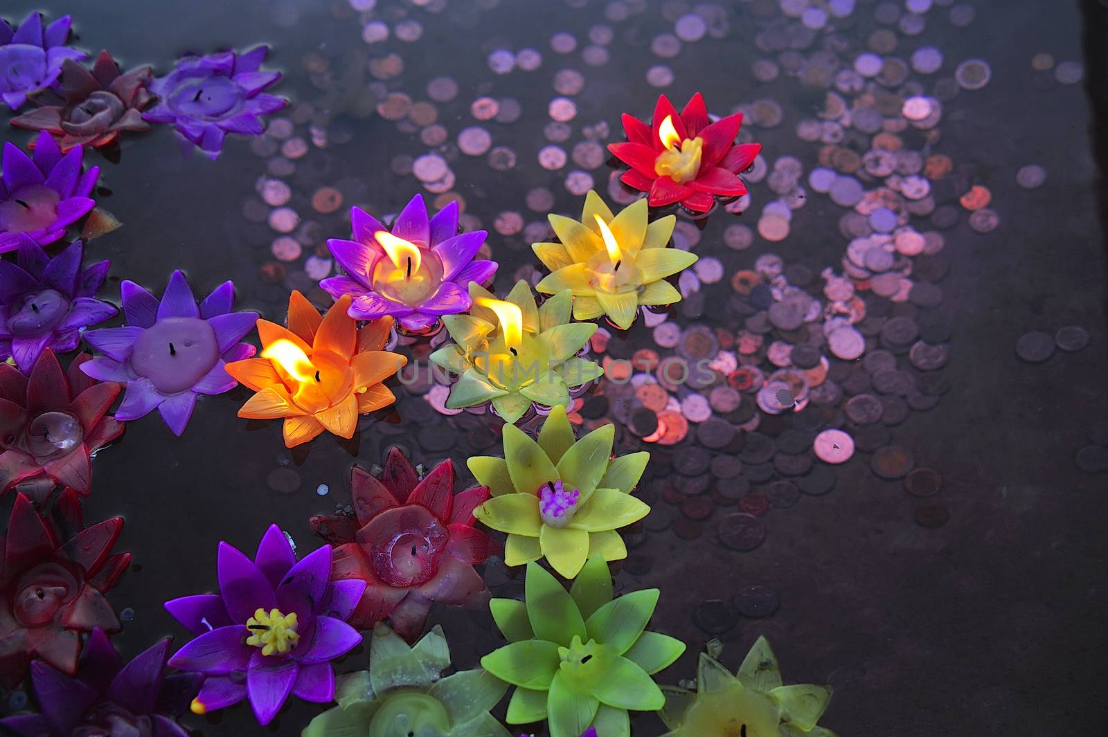 A floating candle in the faith of Buddhism .