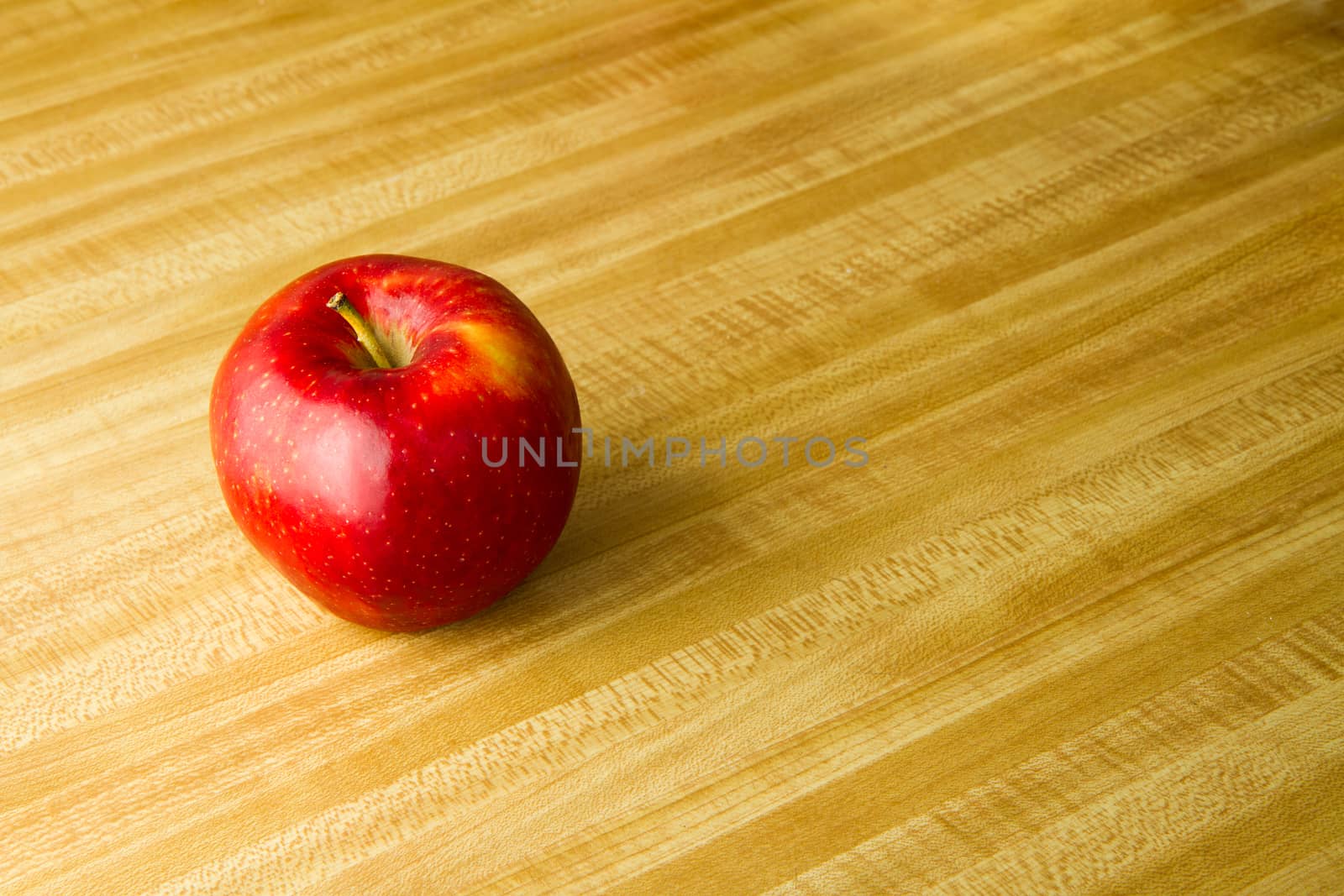 tasty apple just sitting there.