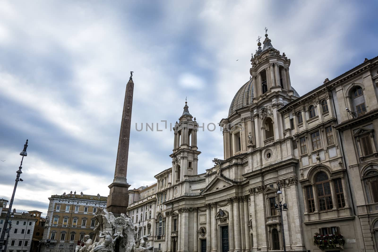 Sant'Agnese in Agone (also called Sant'Agnese in Piazza Navona) is a 17th-century Baroque church in Rome, Italy. It faces onto the Piazza Navona, one of the main urban spaces in the historic centre of the city and the site where the Early Christian Saint Agnes was martyred in the ancient Stadium of Domitian