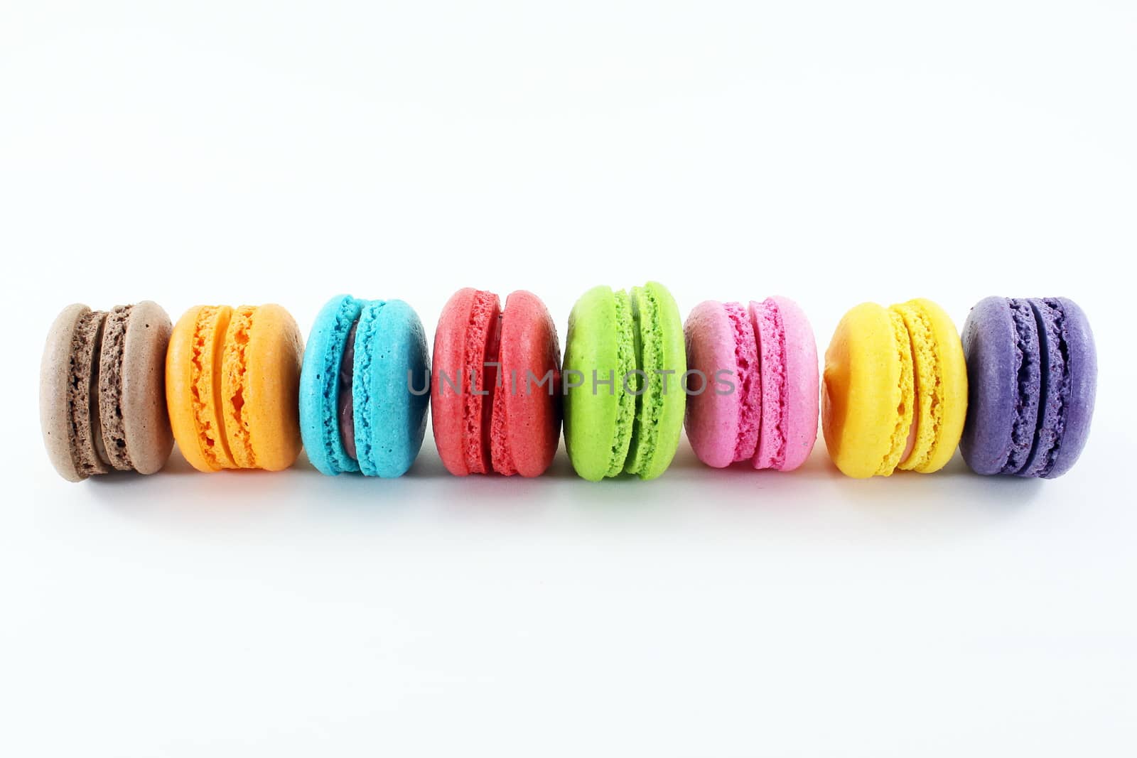 Colorful macaron isolated white background by worrayuth