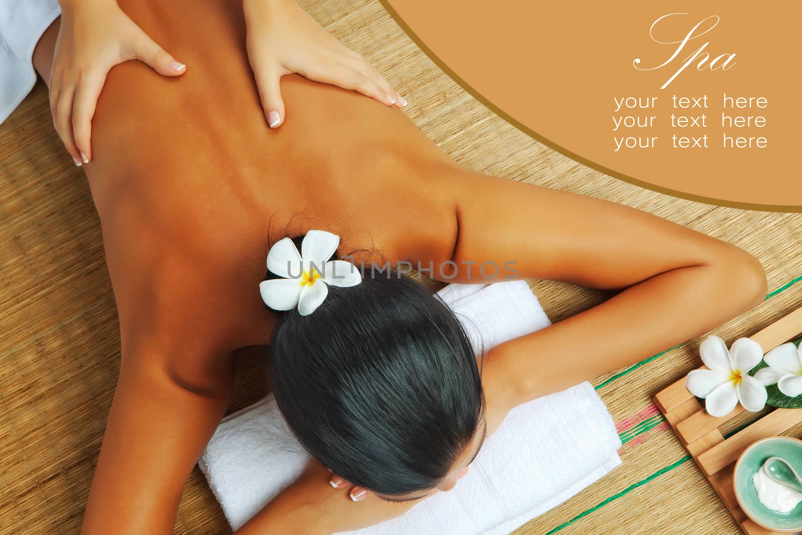 portrait of young beautiful woman in spa environment. banner space for your text