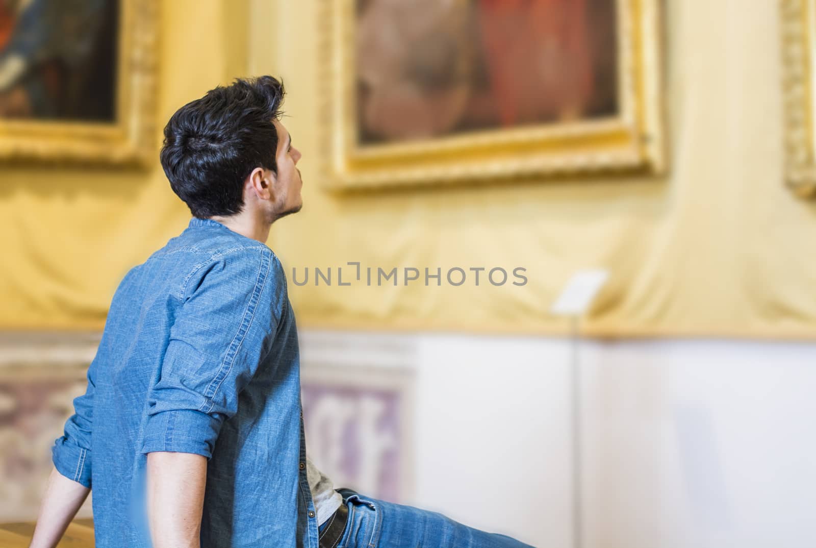 Handsome Young Man Inside a Museum by artofphoto