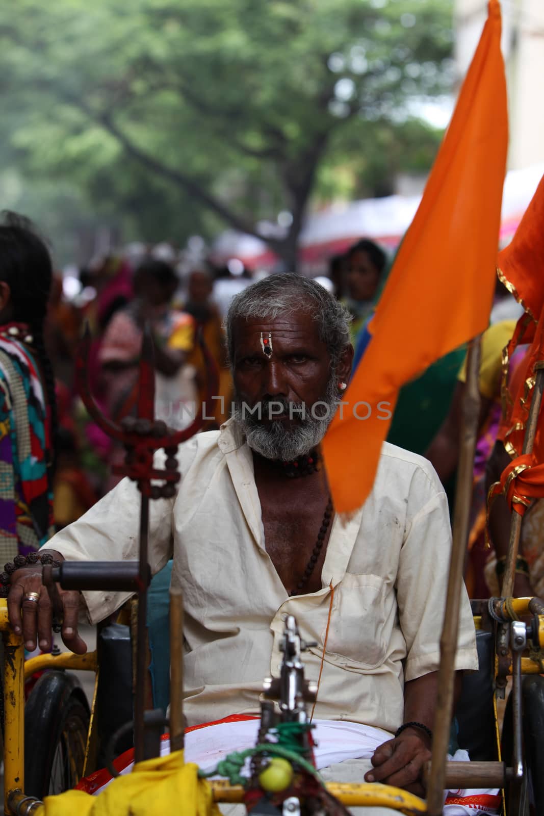 Pune, India  - ‎July 11, ‎2015: An old Indian pilgrim in a traditional attire during a religious wari pilgrimmage festival in India