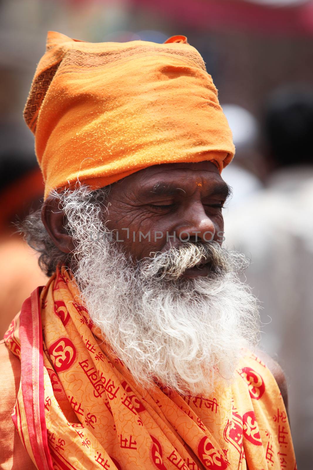 Pune, India  - ‎July 11, ‎2015: An Indian sage of the hindu tradition meditating on his way to a pilgrimmage in India during Wari festival