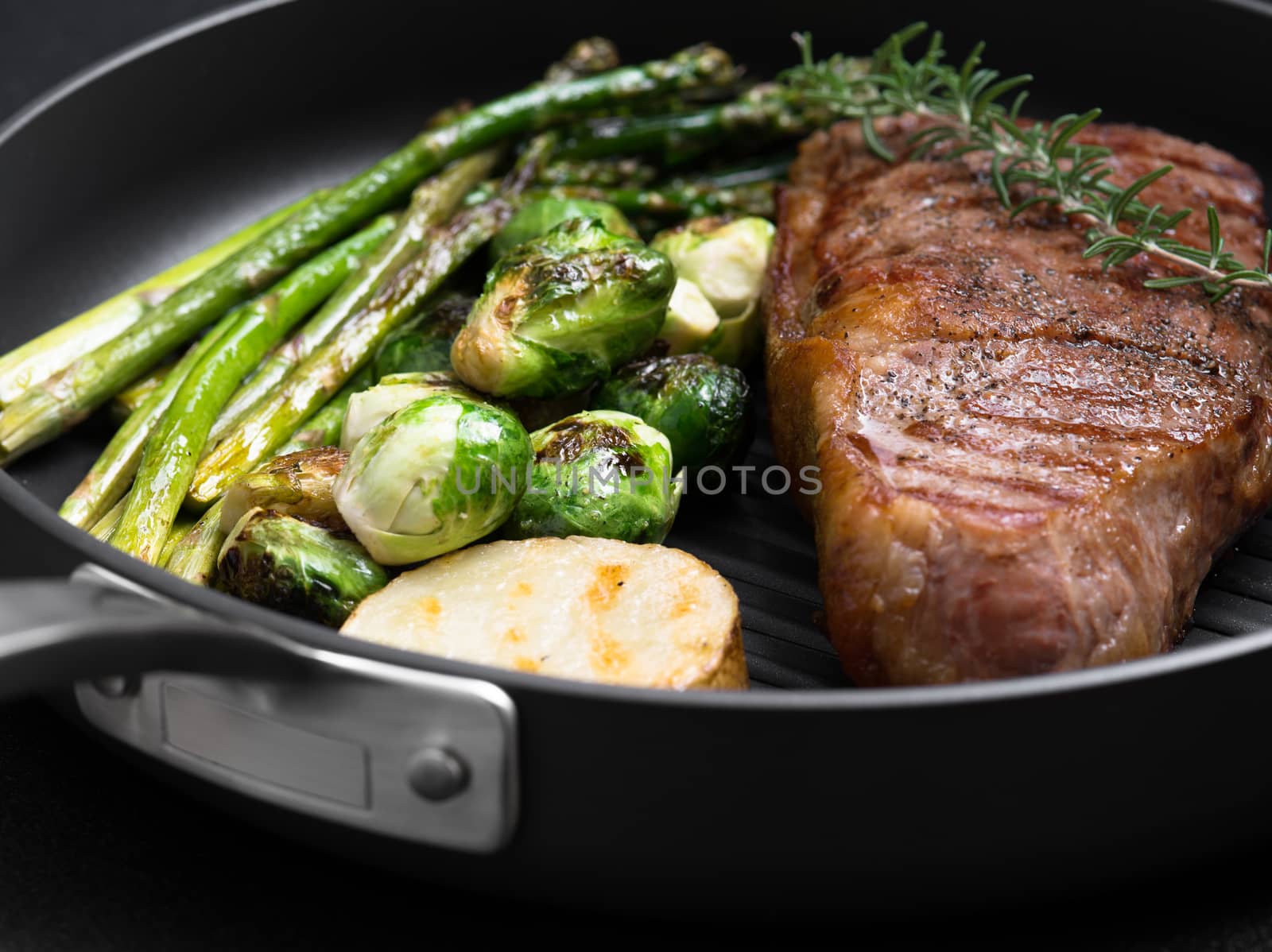 close up view on nice fresh steak on color background