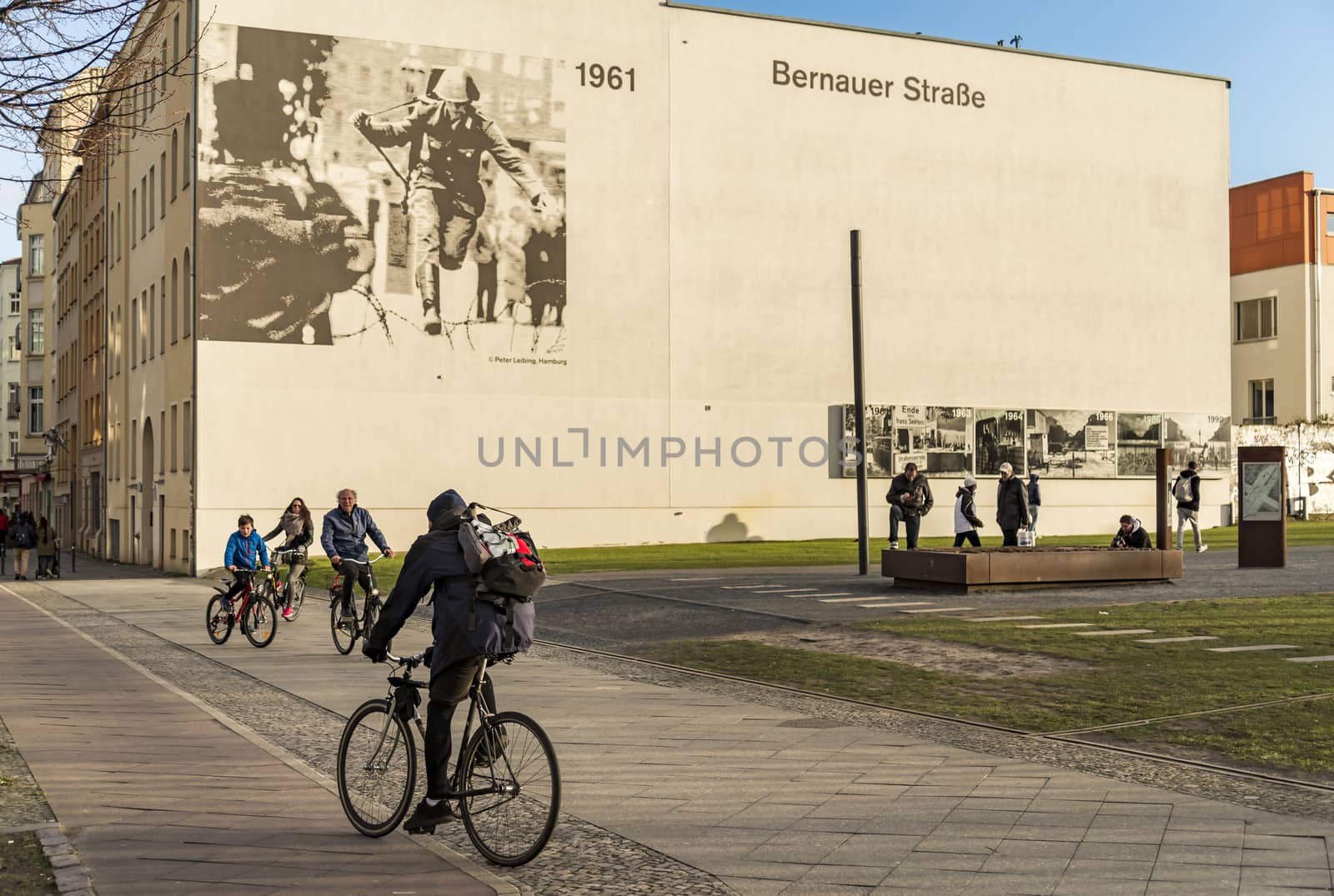 BERLIN - APRIL 3: The Berlin Wall Memorial in Bernauer strasse. This is the intersection with Acker strasse and the photos depict the place over the years on April 3, 2015 in Berlin, Germany.