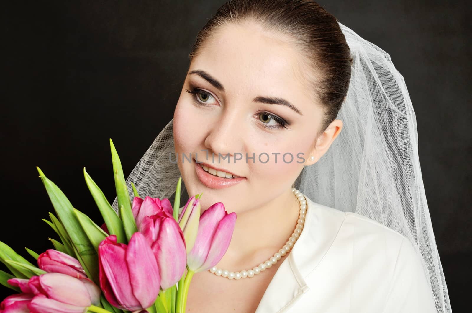 Bride with white veil and flowers by bartekchiny