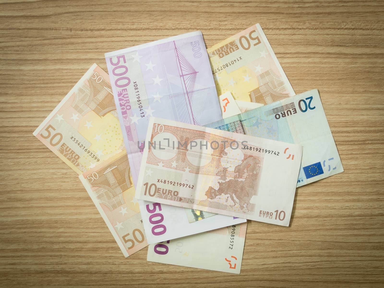 euro banknote  on wood table.