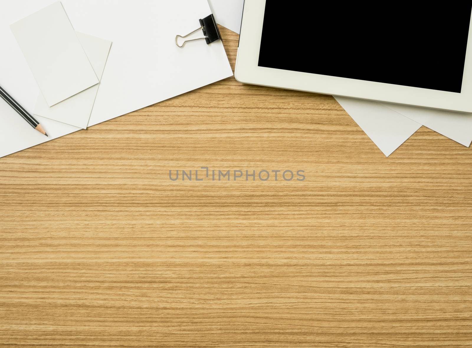 workspace with computer  tablet and paper. View from above