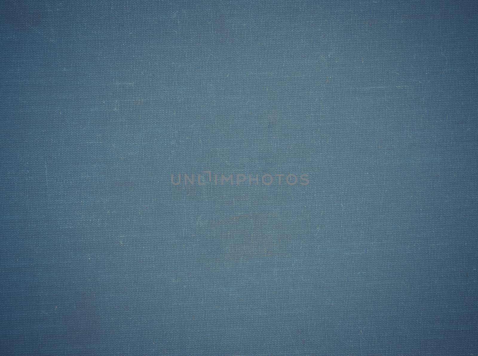 Old blue fabric cover can be used as background.