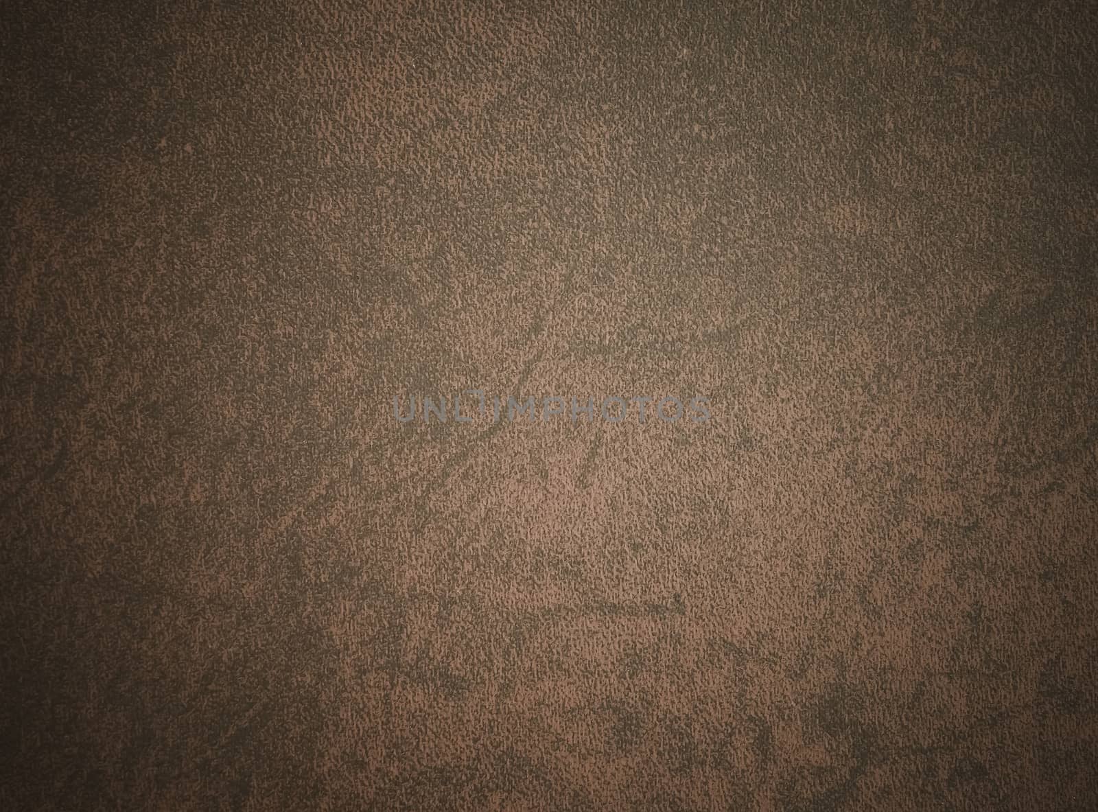 Brown leather book cover used as background.
