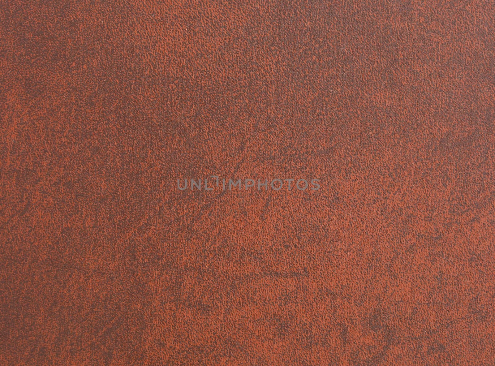 Brown leather book cover used as background.