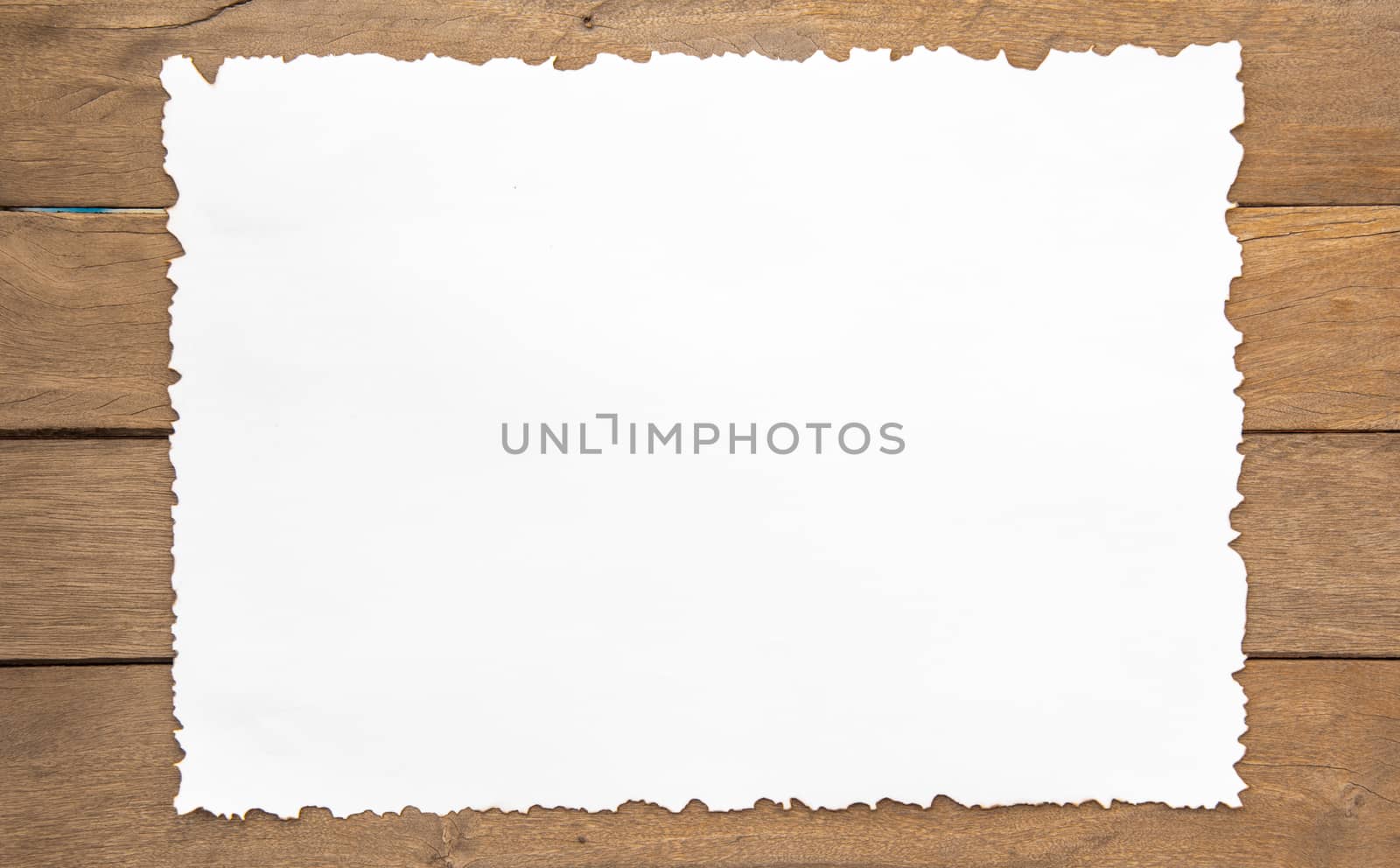 paper on wood background