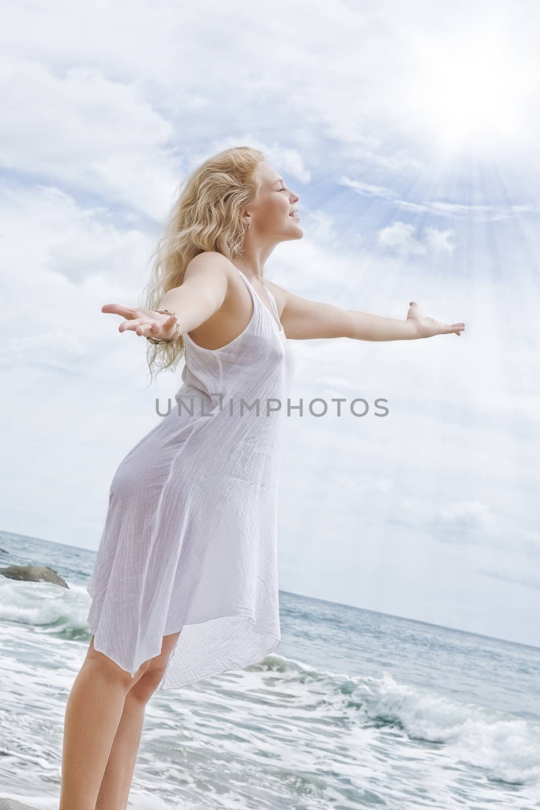 Portrait of nice young woman  having good time on tropical beach