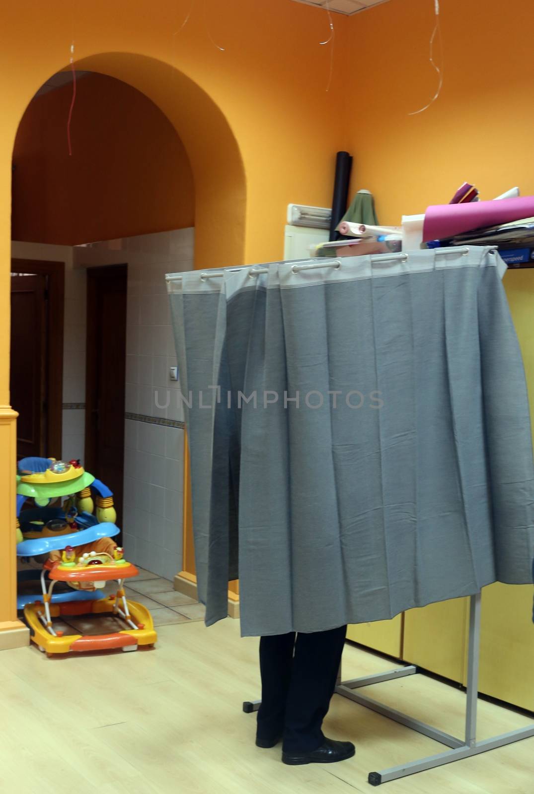 SPAIN, Asturias: A voting booth is pictured in Asturias, Spain on December 20, 2015 as Spain heads to the polls to elect all 350 members of its lower house of parliament in the tightest election in decades which polls suggest will end the traditional two-party system.  