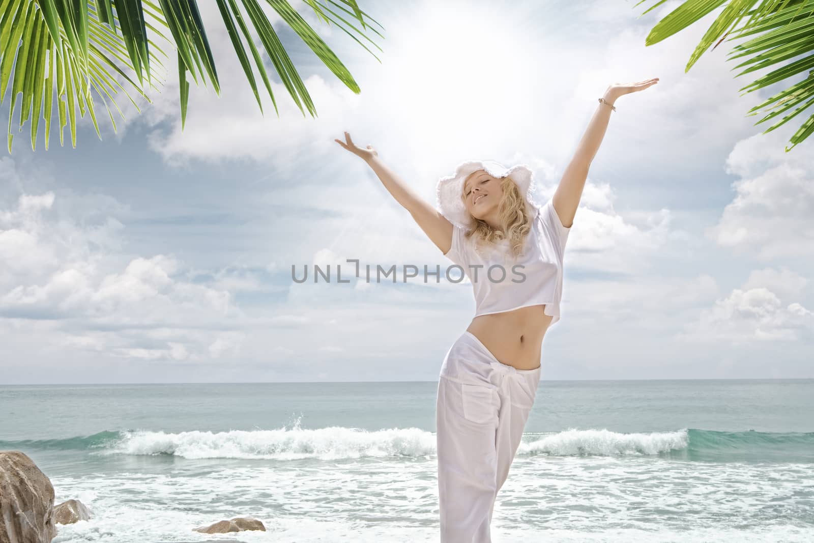 Portrait of nice young woman  having good time on tropical beach