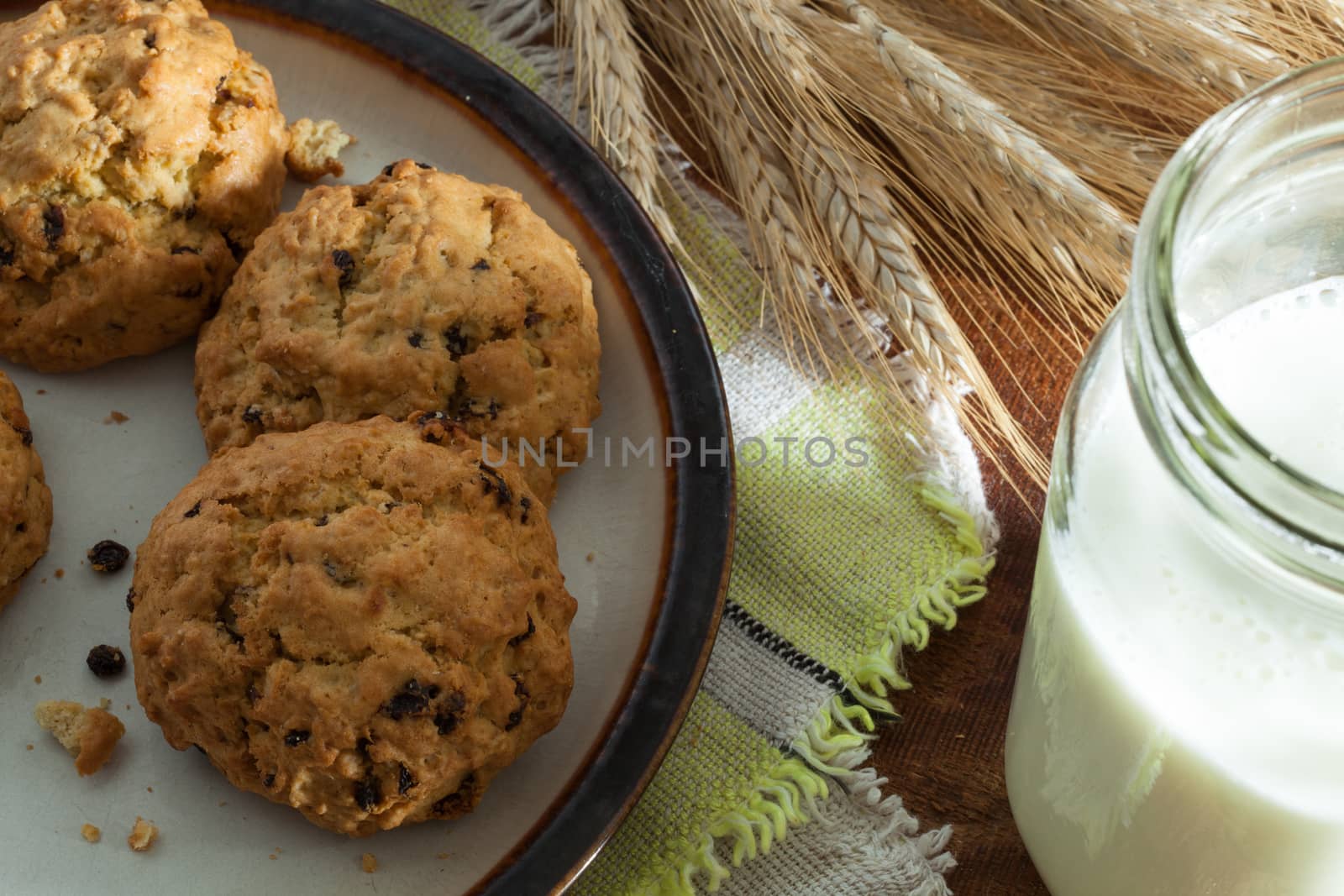 close up view of nice homemade cookies with milk