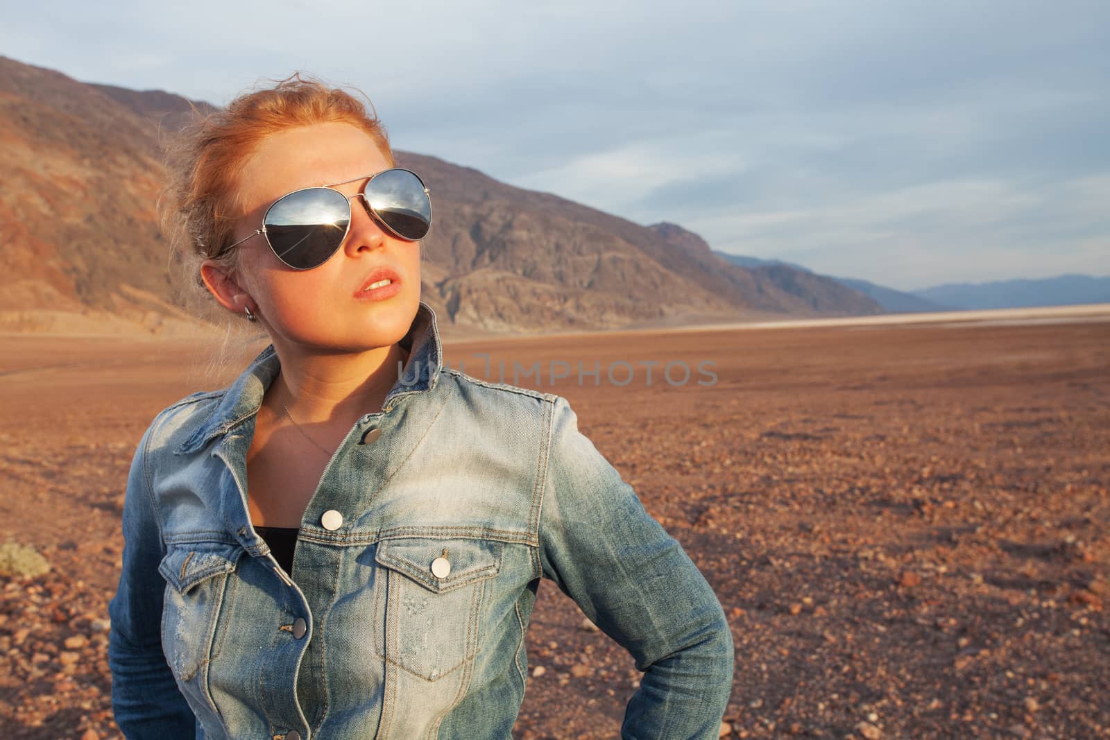 portrait of young beautiful girl in death valley  environment
