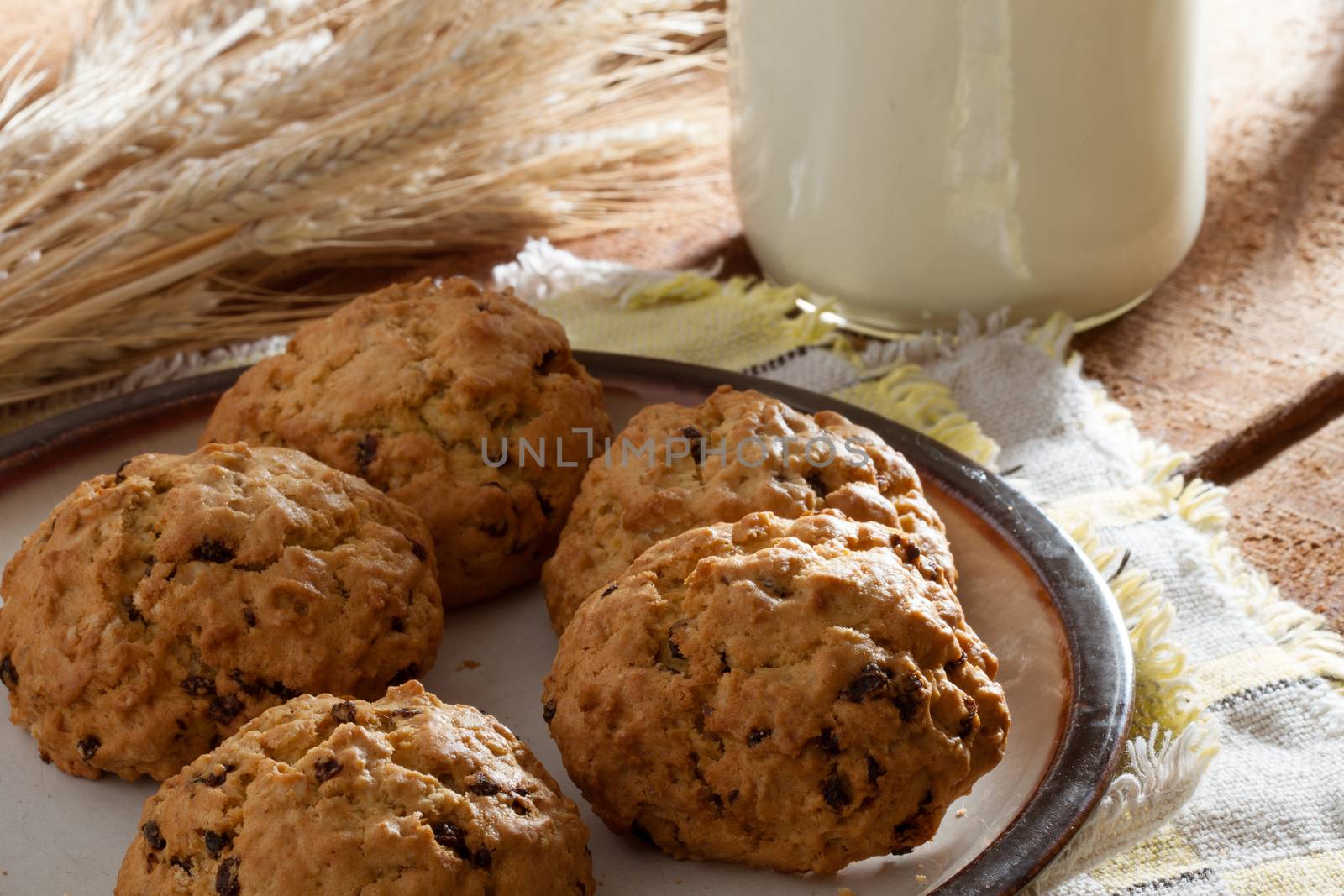 close up view of nice homemade cookies with milk