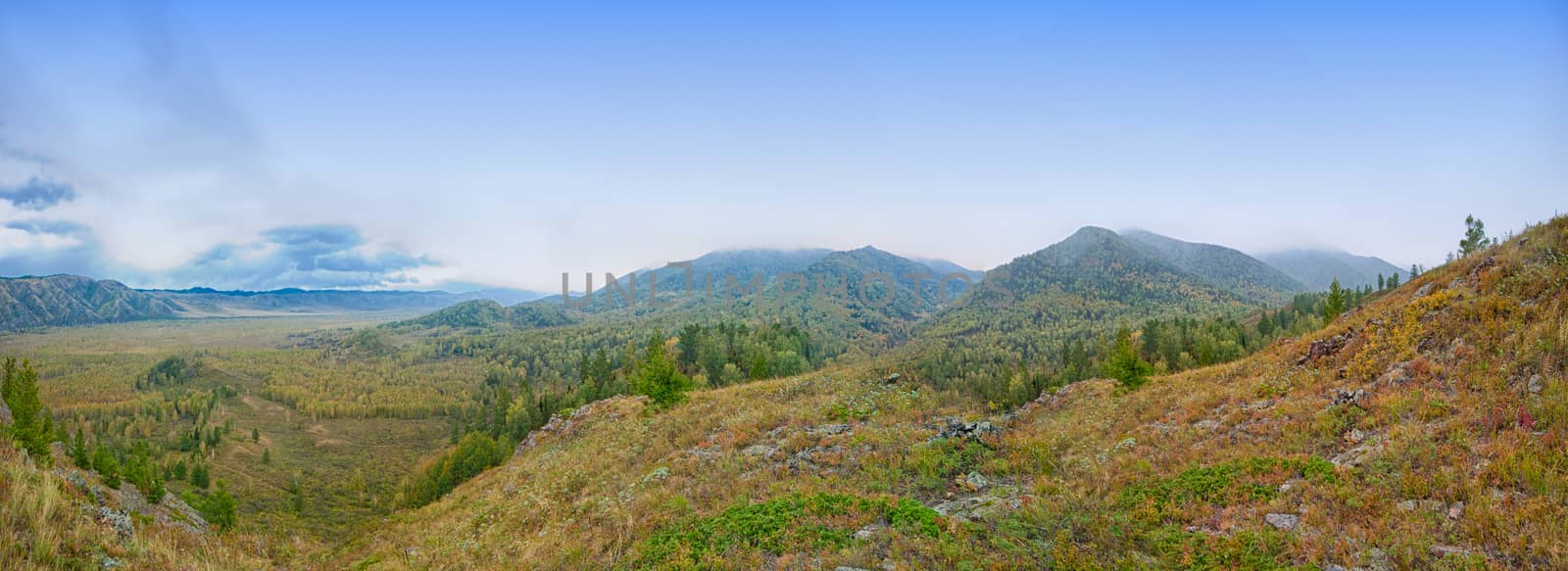 mountains in autumn day by rusak