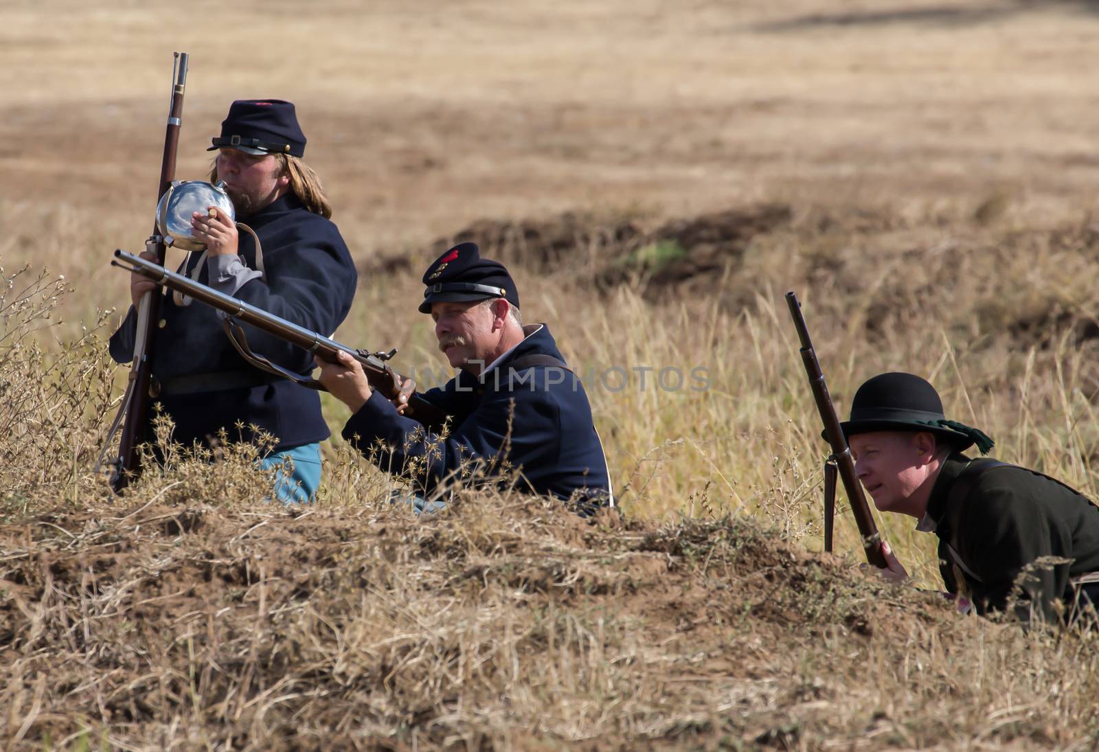 A union sniper takes aim at a target during a Civil War Reenactment at Anderson, California.
Photo taken on: September 27th, 2014