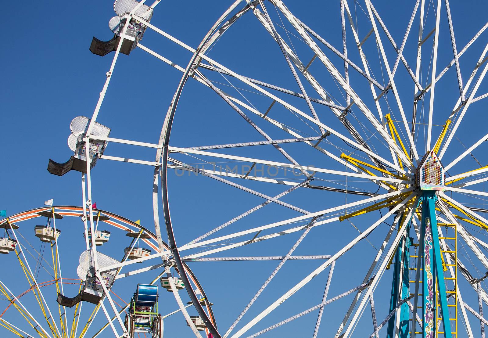 Two Ferris Wheels at the county fair.