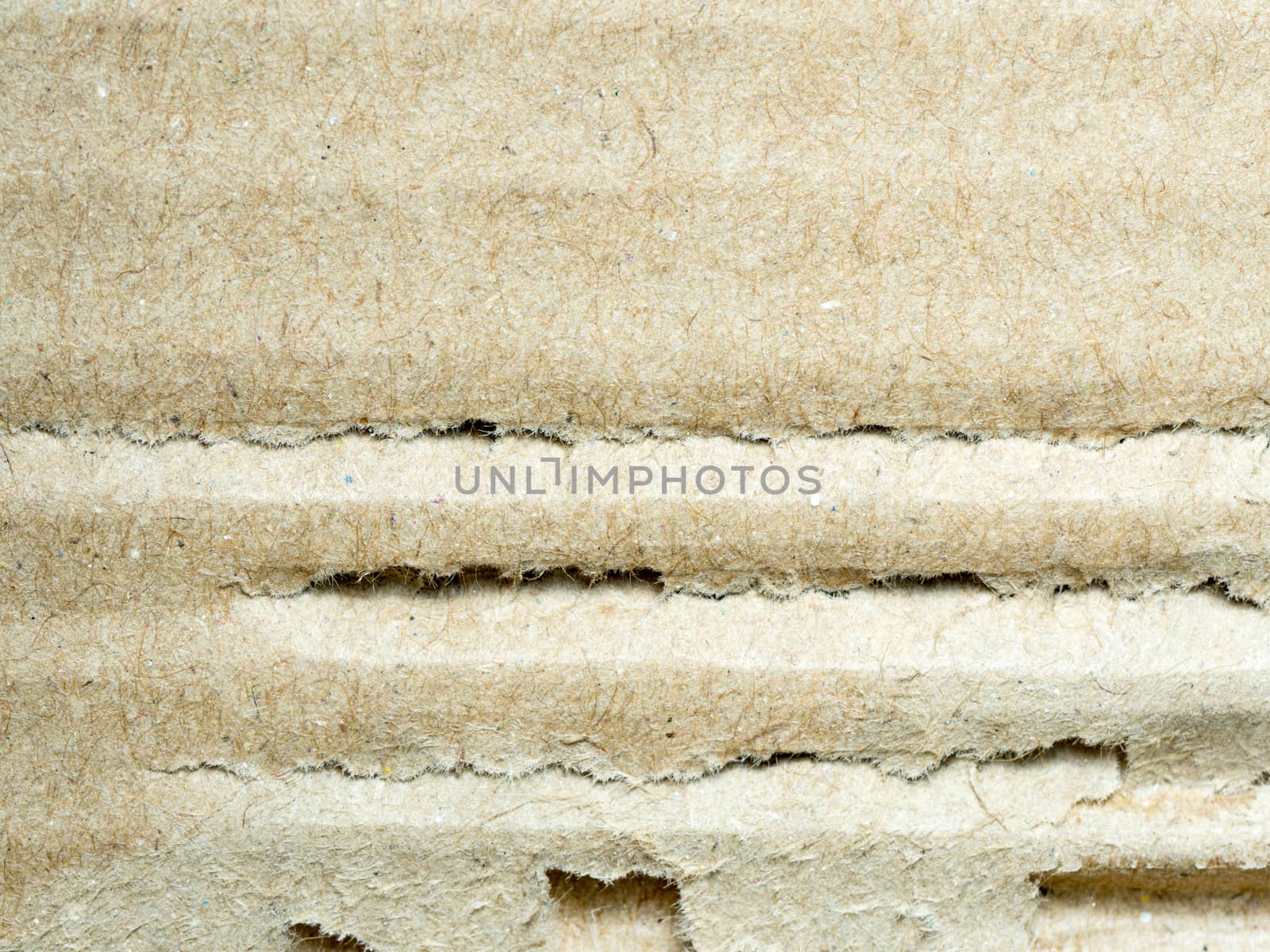 close up scratch  brown corrugated cardboard, abstract background and texture