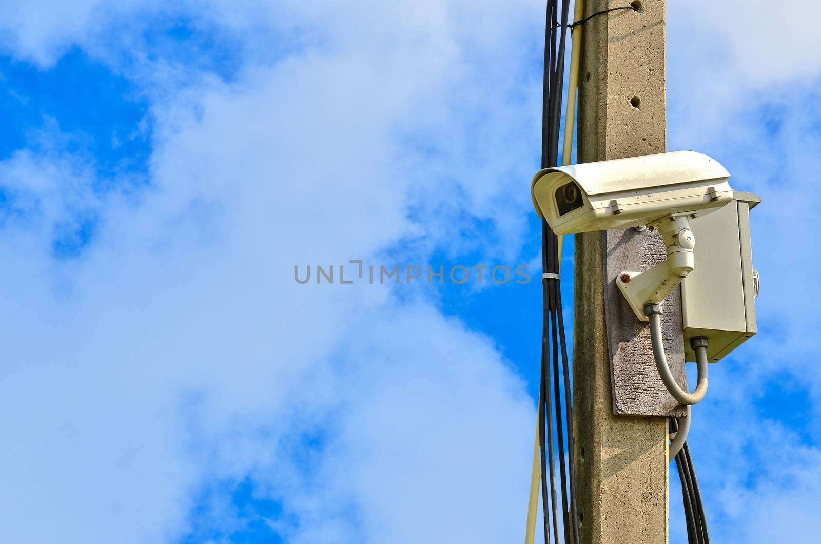 closed circuit camera on blue sky  background