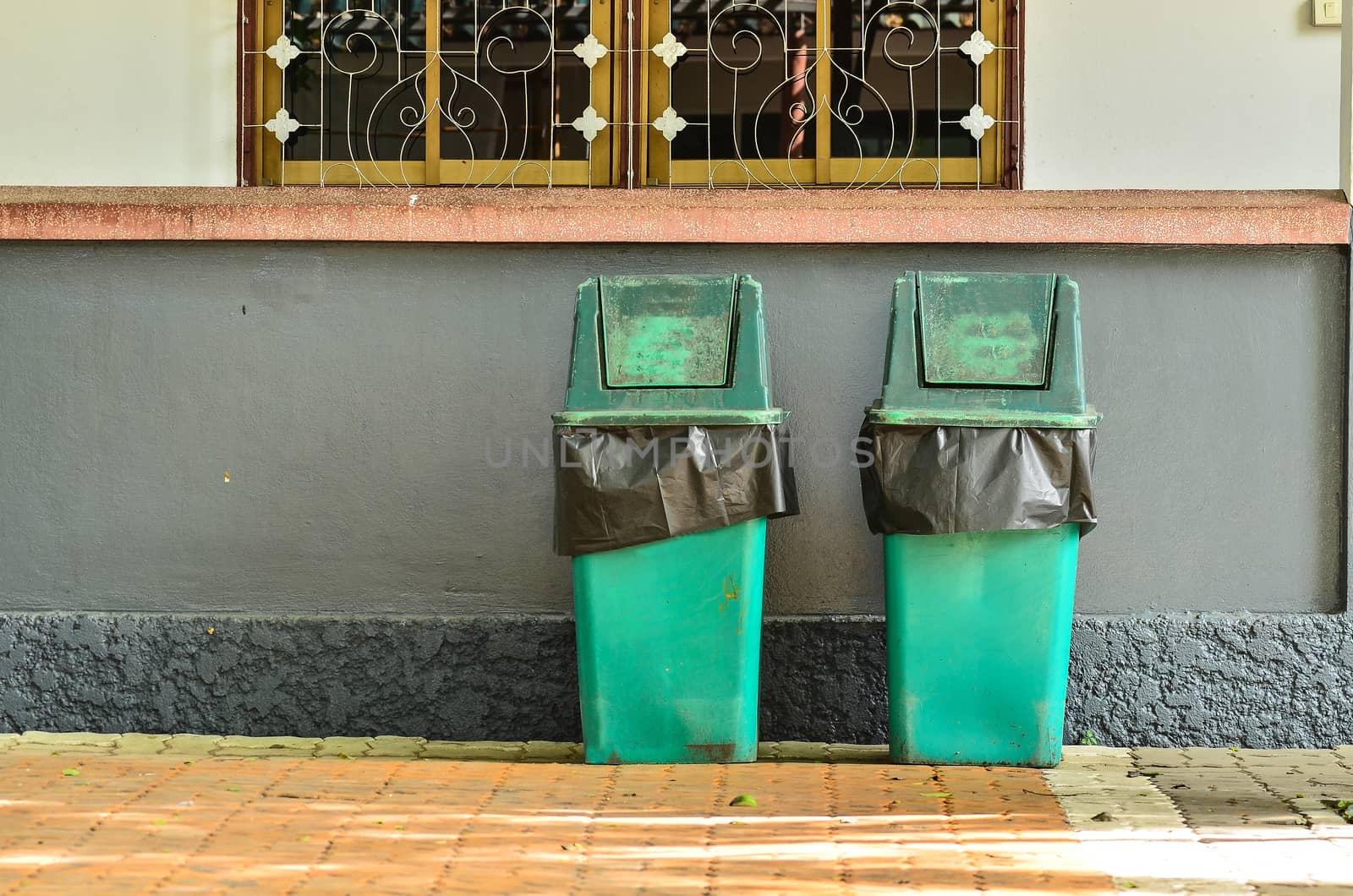 Green trashcan for keeping garbage  by raweenuttapong