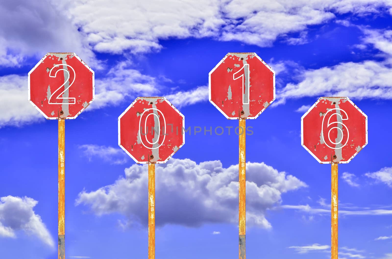Old Traffic Signs with text 2016 on dark blue sky background