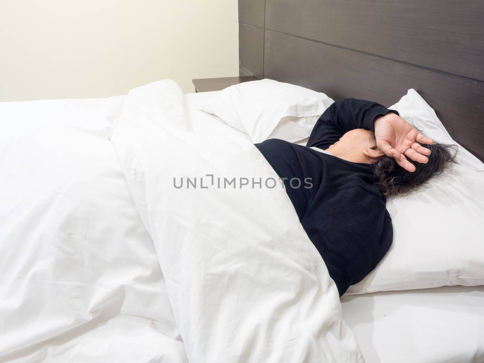 lonely senior woman  sleeping in the bed by APTX4869
