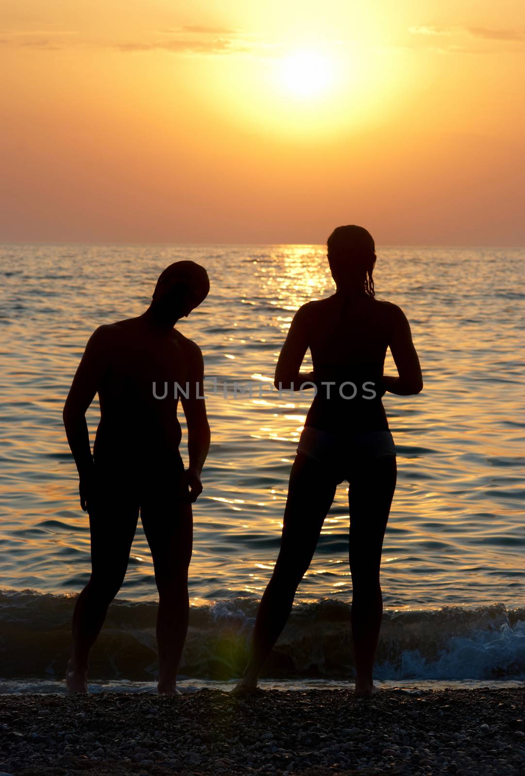 Two people's silhouettes by vapi