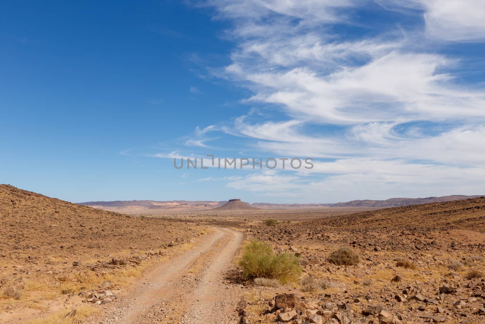 table mountain in the Sahara desert on a background of blue sky, Morocco