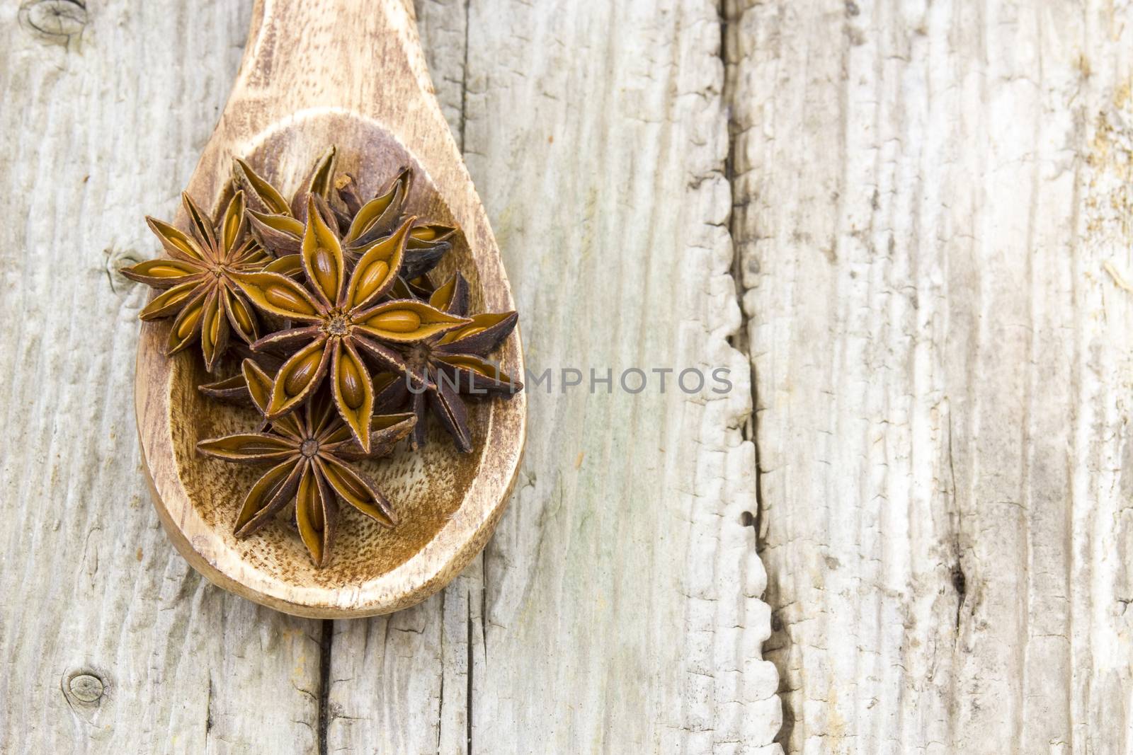 star anise on wooden spoon