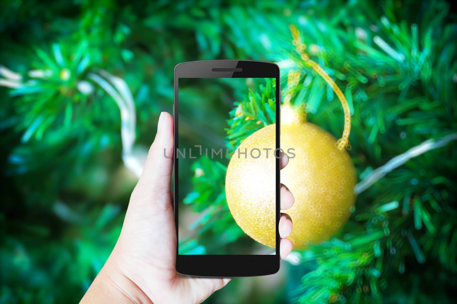 Modern mobile phone in the hand,on blur background image 