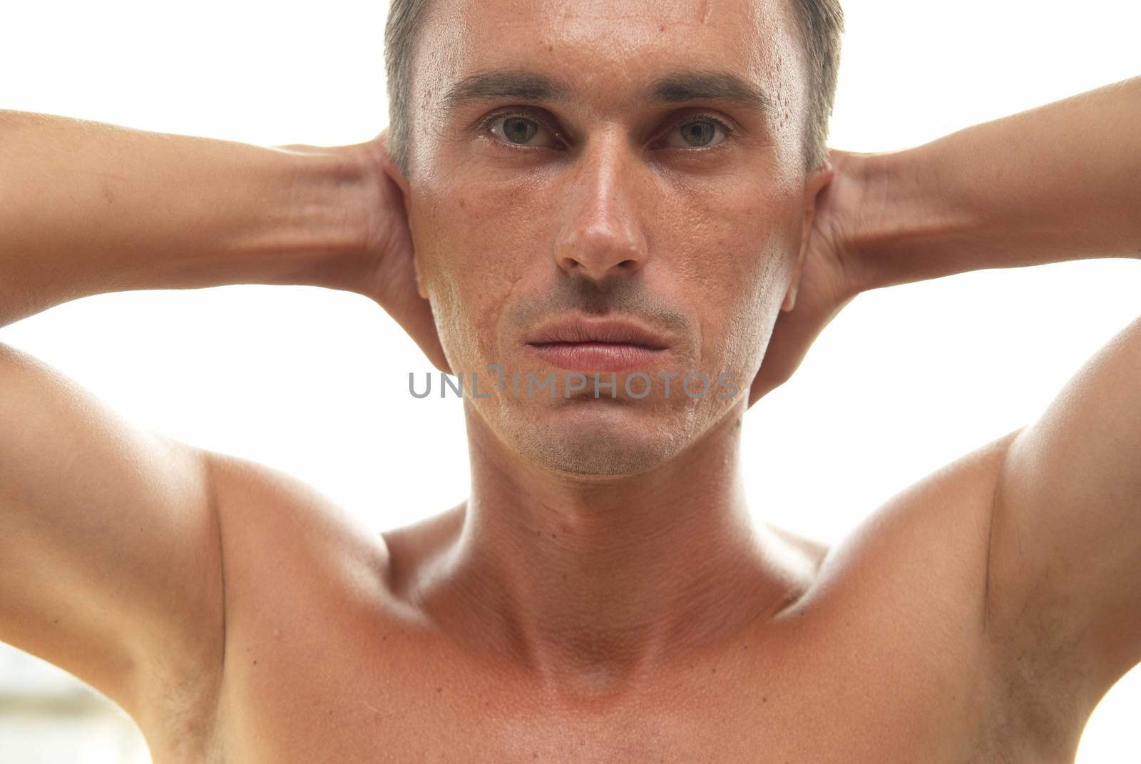 Portrait of muscular man isolated on white